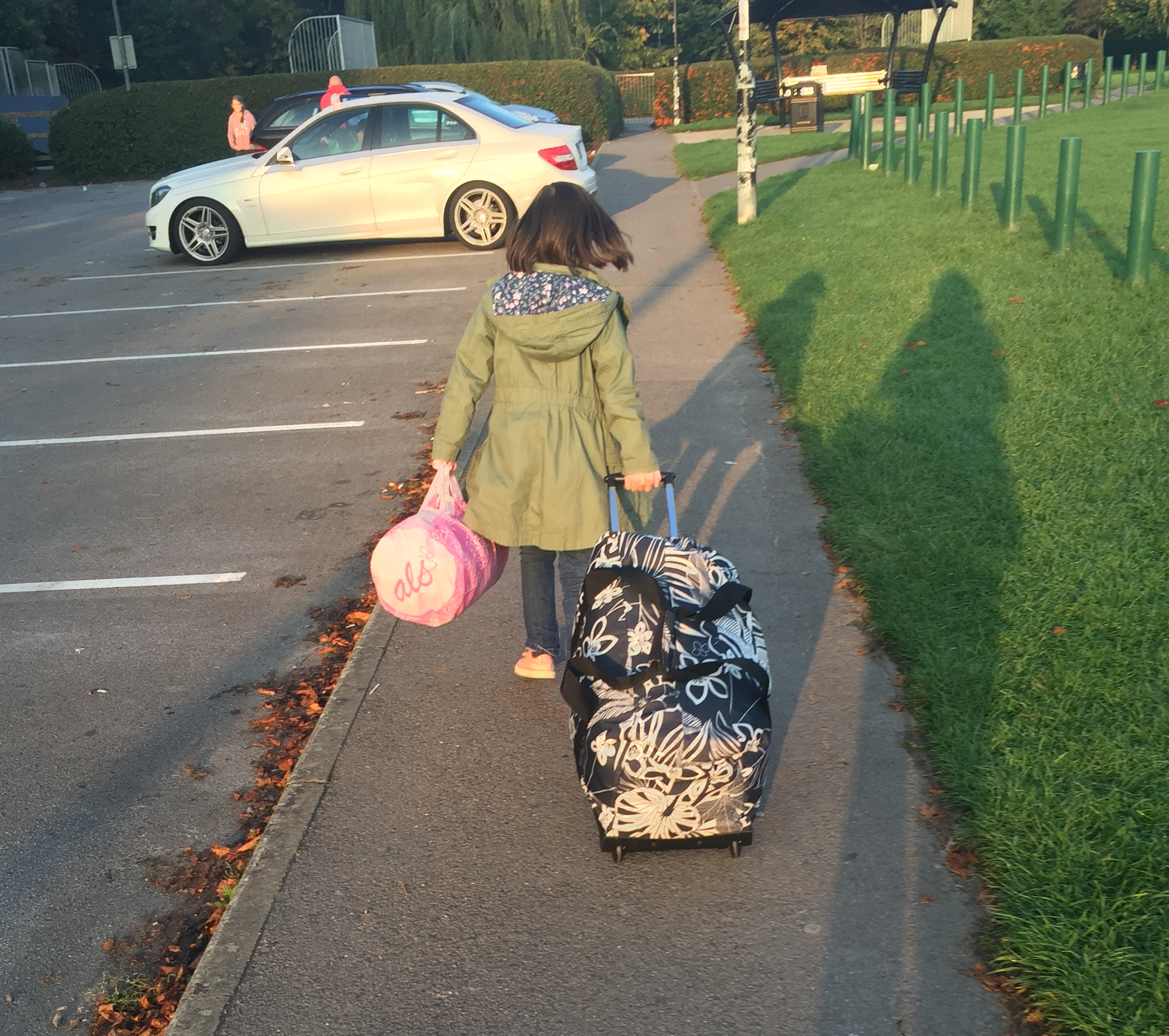 Tanzie heads off to her school trip with her bags.